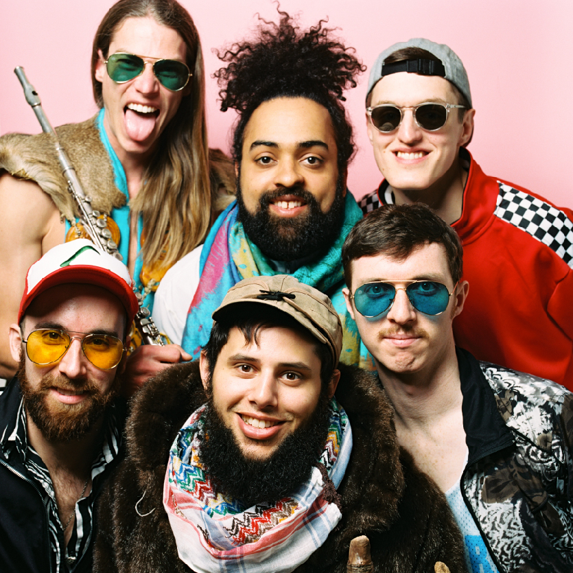 Promo picture of Joe Hertler and the Rainbow Seekers with three members above the other three