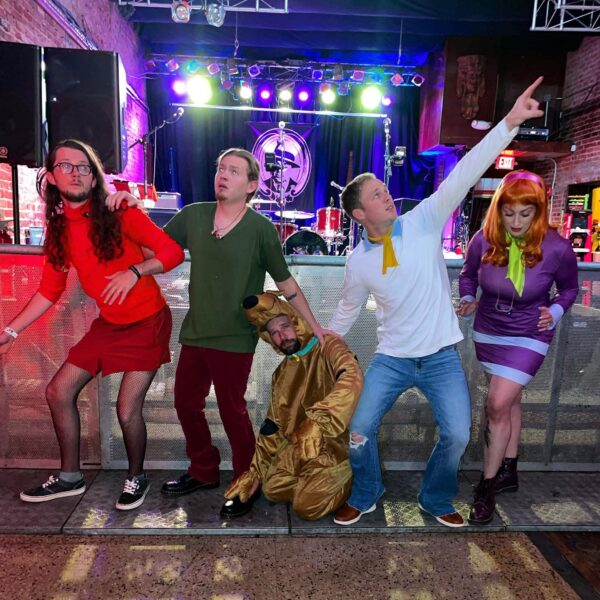 Joey's Van band dressed as members of Scooby Doo's group