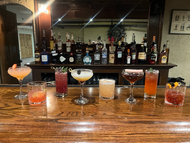 Red Baron Room bar with 8 featured cocktails on display
